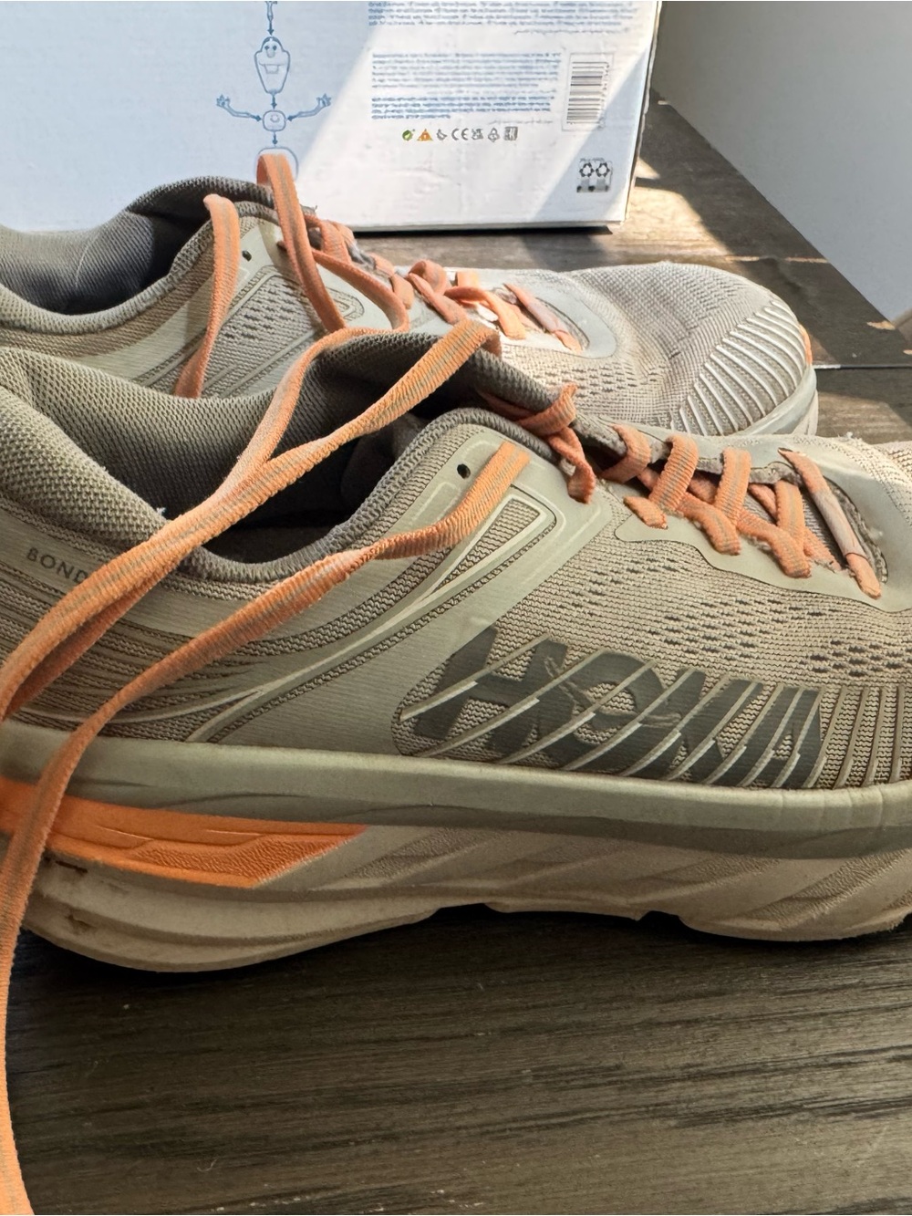 Hoka Women’s Light Gray and Peach Road Running Sneakers